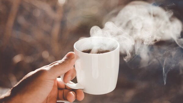 Simple cup with steam rising — quiet tea moment